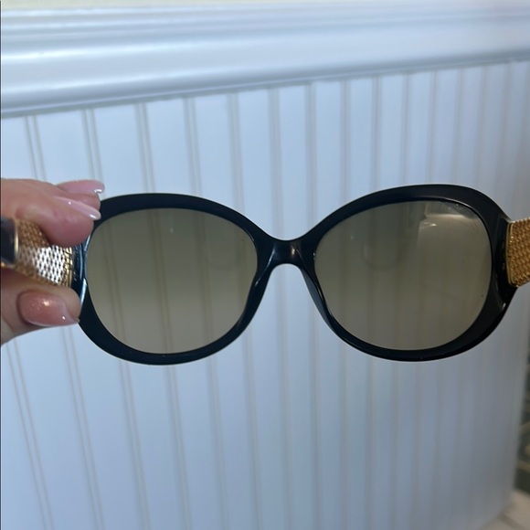 Authentic Gucci Elegant Black Sunglasses with Gold plated temples. main image 6